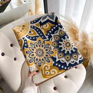 Detailed view of vintage mandala pattern on soft pashmina shawl with premium knit texture