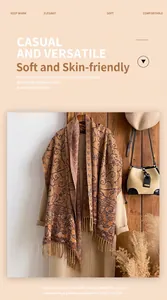 Close-up of soft floral pattern ethnic scarf with elegant fringe tassels in autumn earth tones