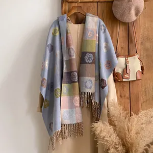 Women's blue winter cashmere-like scarf with vintage rose jacquard and tassel edge