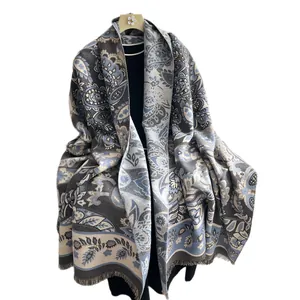Elegant blue paisley shawl with fringes for women featuring classic ethnic embroidery patterns