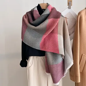 Detailed close-up showing the fine pleated texture and multi-color patchwork of the scarf