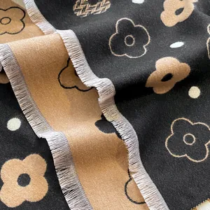 Reversible floral faux cashmere shawl with herringbone pattern and short fringe edge