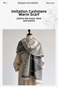 Detail of grey and beige geometric pattern cashmere-like scarf with soft fringe edges