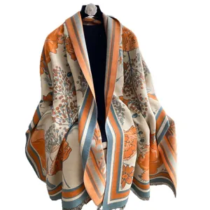 Classic floral double-sided cashmere-like scarf with fringe edges and warm orange tones