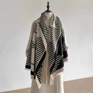 Faux cashmere shawl for women with geometric black and beige stripes and fringe