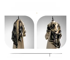 Detail of tulip patterned scarf showing fringed edges and versatile styling options