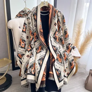 Ethnic geometric print cashmere-feel shawl with tassel fringe in orange and black