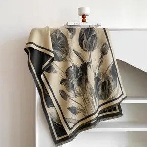 Elegant beige cashmere tulip scarf with vintage black floral print and fringe details