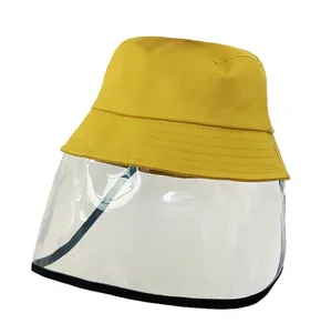 Kids yellow cotton sun hat with a removable clear face shield for splash protection