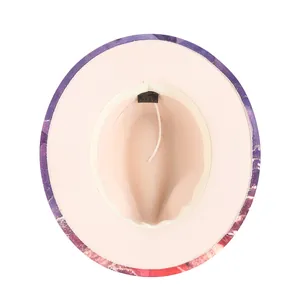 Détail de l'intérieur du chapeau fedora montrant le cordon réglable et l'étiquette coton