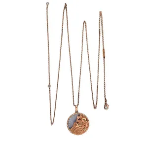 Long golden necklace with dragon relief on a purple semi-precious stone coin pendant