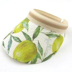 Women's straw sun visor with lemon patterns and striped ribbon for summer outdoor use