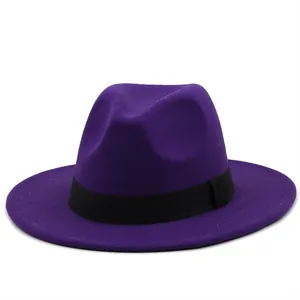 Detail of classic purple wool fedora hat with elegant black decorative ribbon band