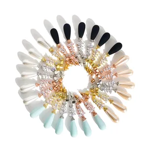 Orecchini di lusso con perle multicolori e zirconi marquise disposti in modo radiale
