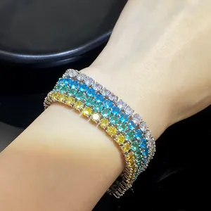 Detail of four-row gradient rainbow tennis bracelet with 4mm cubic zirconia stones