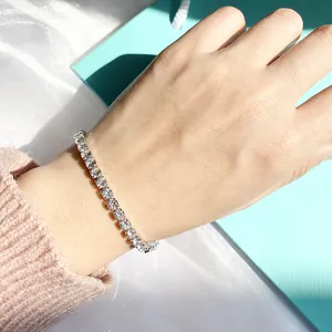 Classic tennis bracelet with 4mm round cubic zirconia in silver-plated 4-claw setting