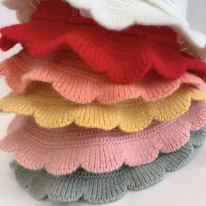 Detailed knit texture and wave brim of kids crochet sun hats in multiple vibrant colors
