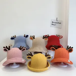 Close-up of multi-color baby bucket hats with deer horns and cute ear details