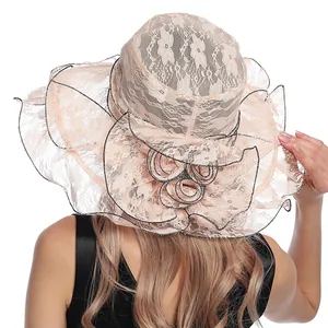 Peach pink organza sun hat for women featuring lace floral patterns and a wide brim