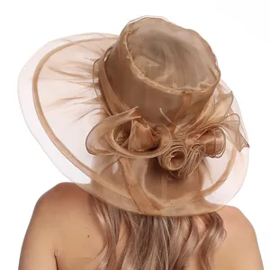 Elegant champagne organza sun hat with oversized brim and floral bow detail