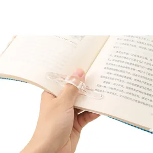 Clear acrylic thumb book page holder with ergonomic wing design for easy reading
