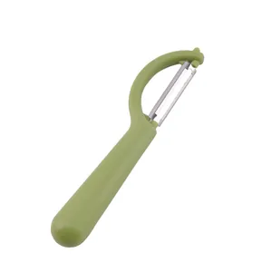 Green stainless steel vegetable peeler with ergonomic handle on a white background