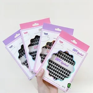 Detailansicht von DIY-segmentierten schwarzen Wimpern in lila und rosa VBS-Verpackungen