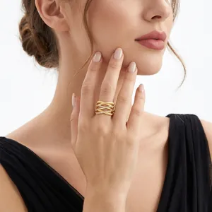 Elegant gold criss-cross multi-layer open ring featuring sparkling pavé micro-zircons