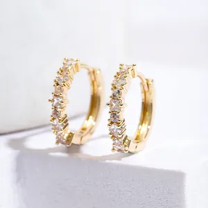 Elegant gold-plated hoop earrings featuring inlaid square white cubic zirconia crystals