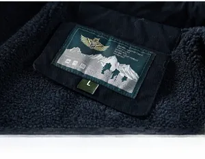 Detail view of winter jacket inner lining with warm fleece and breathable size L neck label