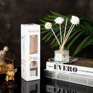 Detail of jasmine reed diffuser set with fiber sticks, handmade flowers and luxury gift box