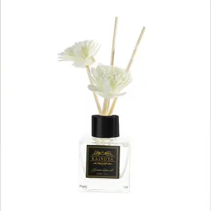 Detail view of 50ml glass aroma diffuser bottle with sola flowers and fiber reeds