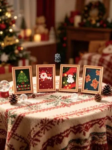 Detailed view of four Christmas resin photo frames with gingerbread man and santa motifs