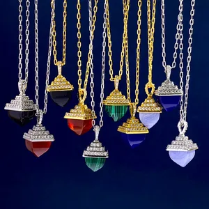 Macro detail of pyramid gemstone pendants with pavé zircon setting in various vibrant colors
