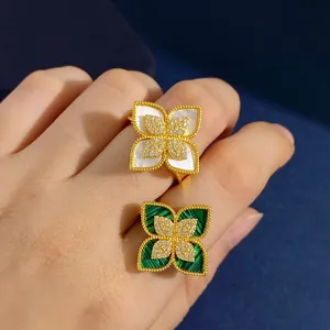 Luxurious gold flower rings with malachite and mother of pearl insets for women
