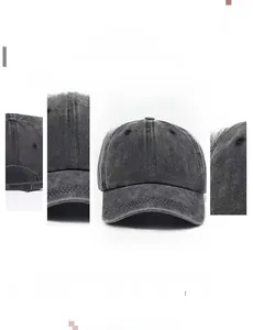 Detail view of washed grey baseball cap with palm tree embroidery and metal buckle closure