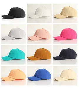 Grid showing 12 colors of soft cotton baseball caps with curved brims and six-panel design