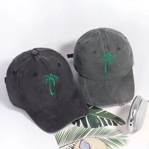 Washed grey cotton baseball cap with green coconut tree embroidery and curved brim