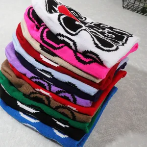 Y2K style colorful knit beanies with jacquard heart patterns and diverse color options