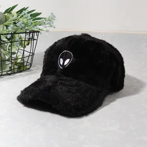 Plush winter baseball cap in black with white alien embroidery for warmth and style