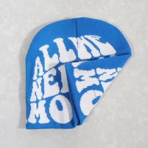 Detail of blue knitted beanie with white ALIVE NEIGHBORHOOD jacquard lettering