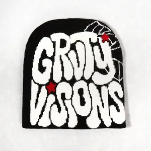 Streetwear black knit beanie featuring white GROTY VISONS graffiti font and red stars
