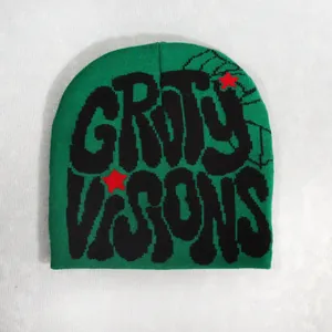 Green knit beanie with black Dirty Visions graffiti letters and red stars streetwear style