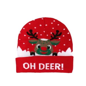 Christmas knit beanie with reindeer pattern and OH DEER text in red, white and green