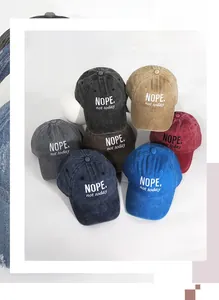 Detailed embroidery showing NOPE not today text on a washed cotton baseball cap