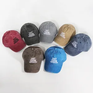 Multiple colors of washed cotton baseball caps with Shit Show Supervisor embroidery