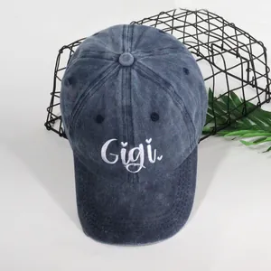 Washed navy blue Gigi embroidered baseball cap with a breathable six-panel design