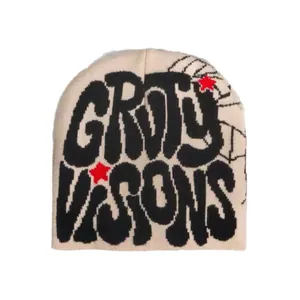 Retro beige knit beanie featuring black graffiti letters and red star embroidery