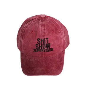 Washed burgundy cotton baseball cap with black embroidered SHIT SHOW SUPERVISOR lettering
