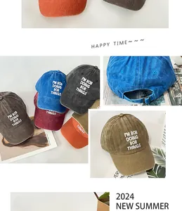 Close-up of vintage washed cotton baseball cap featuring embroidered I'M BOB lettering
